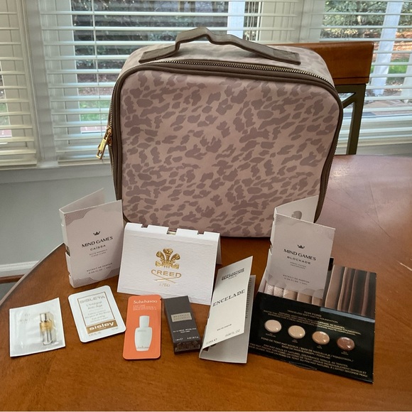 Neiman Marcus Other - TRAVEL MAKEUP BAG  NEIMAN MARCUS WITH SEVERAL MINI SAMPLES NEW